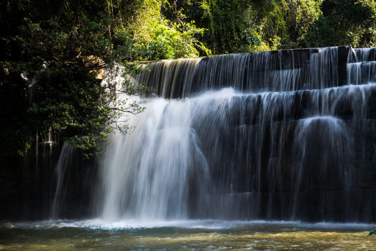 Beautiful waterfall in natural 'Si Dit Waterfall' with blue sky in khao kho national park © poowadon