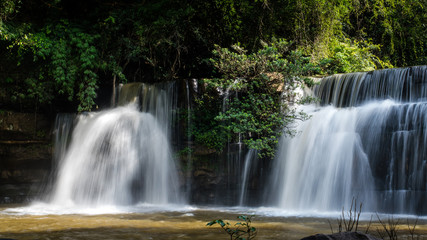 Beautiful waterfall in natural 'Si Dit Waterfall' with blue sky in khao kho national park 