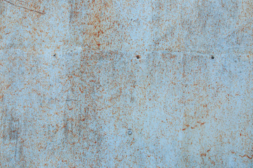 Rusty metal texture with natural defects. Scratches, grungy, cracks, corrosion. Can be used as a background or poster for an inscription.