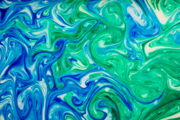 Beautiful abstract painting is a painting technique Ebru .Turkish Ebru style on the water with acrylic paints wring wave.Stylish combination of luxury.Contemporary art marble liquid texture  