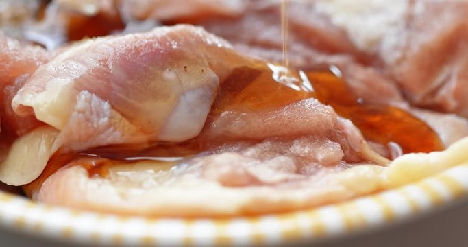 Add oil to marinade chicken fillet