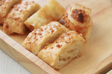 Bread cut into pieces, sprinkle with grains.
