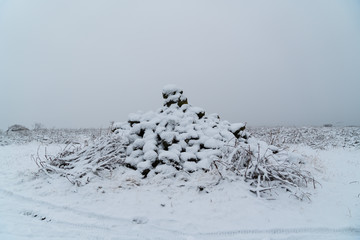 Pile of rocks found on a mountain during a snowy day in Iceland