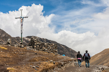 Couple holding hands walking at pilgrimage of lord of Coyllority, in Cusco Peru
