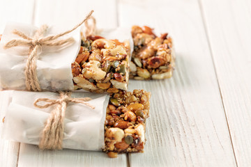 Homemade Superfood breakfast bars with roasted nuts as almond, cashew nut, pumpkin seeds, sesame seeds, honey on white background – Image