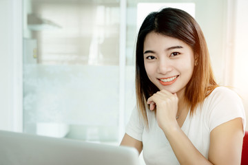 Young asian girl is freelancer with her private business at home office, working with laptop, coffee, online marketing, Customer order and packaging or packing.