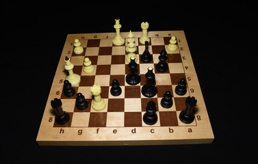 Chess board and white chessmen as a strategy theme