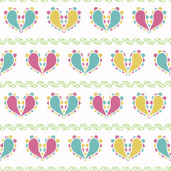 Vector Colorful Paisley Hearts Design on green seamless pattern background.