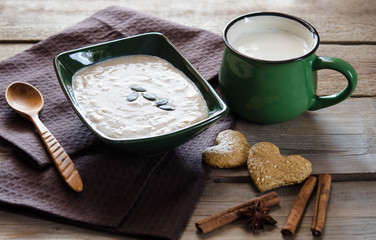 Healthy breakfast. Sesame dry cookies in the form of heart porridge of amaranth with pumpkin seeds and yogurt.