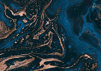 Obraz na płótnie Canvas Contemporary painting. Abstraction. Unique hand painted image for creative design of posters, wallpapers. Modern piece of art. Mixed media artwork. Unusual artistic style. Blue and bronze oil paints.