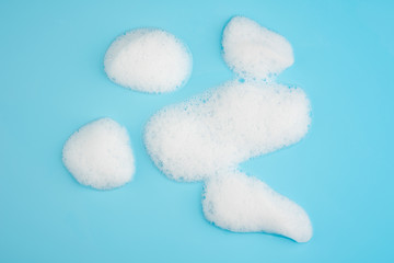 Group of foam bubble on blue background on top view object beatuy health care concept design