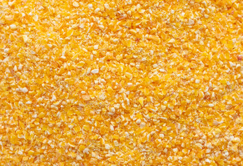 Cornmeal mush in a white saucer on a gray concrete background