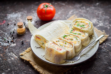 Lavash roll with cottage cheese and sweet pepper.