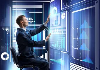 Businessman using media interface