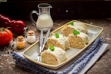  Lavash roll with crab sticks, fresh cucumbers and greens. © Alena