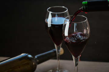 Pouring red wine 