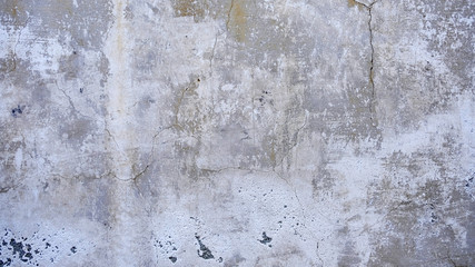 Old concrete cracked grey wall texture