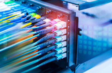 optical fiber telecommunication equipment and patchcords inside a network infrastructure.