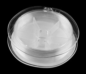 fishing line isolated on black background close up