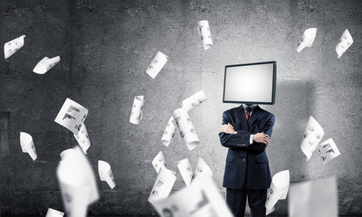 Businessman with TV instead of head.