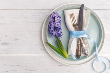 Easter place setting with easter eggs. Top view. Copy space.