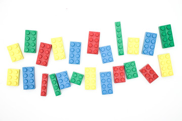 Colorful bricks on white background