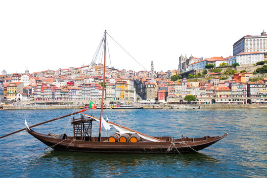 Typical portuguese wooden boats, in portuguese called barcos rabelos, used in the past to transport the famous port wine (Portugal) - Image on white background for easy selection