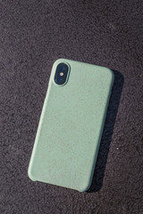  Smartphone on dark  background. Phone with two cameras, backside. 