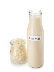 Bottle of rice milk on white background