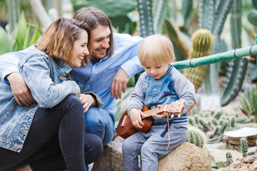 Young Happy Family Of Three