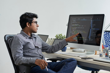 Coder working on computer