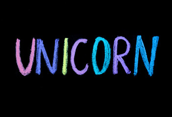 colored sign unicorn on blackboard