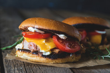 Cheeseburger with chopped meat, cheese and vegetables