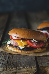 Cheeseburger with chopped meat, cheese and vegetables