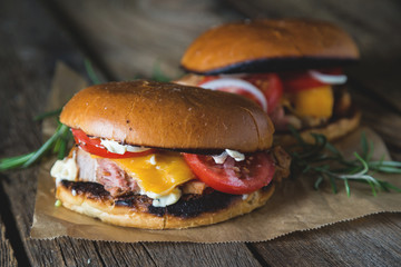 Cheeseburger with chopped meat, cheese and vegetables