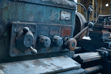 old rusty dirty machines and mechanisms in an abandoned factory