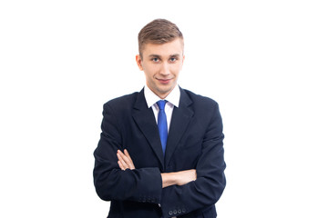 young attractive serious business man straightens bright blue tie, isolated on white