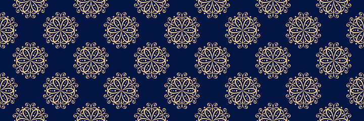 Floral print. Golden pattern on dark blue seamless background