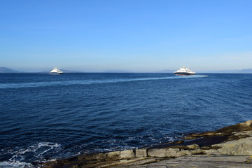 Two passenger ferries. North Sea. Norway