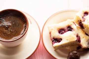 Homemade cherry pie with coffee cup isolated on white background