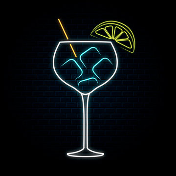 Neon gin tonic glass with lemon and ice. Vector isolated illustration. Icon for night bar background. Led luminous sign for cocktail restaurant signboard.