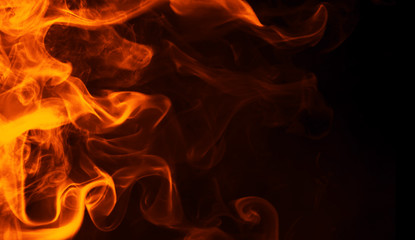 Fire flames texture on isolated black background. Perfect texture for copy space