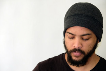 Mixed Race Man with beard close up portrait