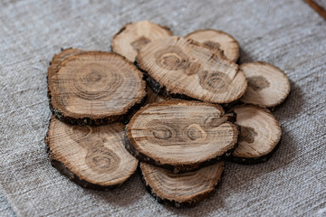 Cuts of oak branches on the fabric
