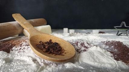 spices in wooden spoon