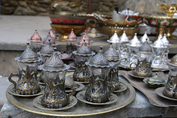  Ancient oriental tea set, Oriental souvenir. Traditional silver coffee cup set in a tray 