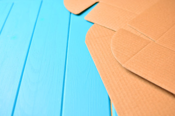 Unwrapping cardboard package box background, copy space