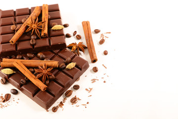 chocolate bar with spices isolated on white background