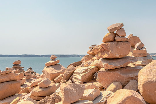 Mound of stones placed conically one above the other, as an offering made by tourist in Abu Simbel, Aswan, Egypt