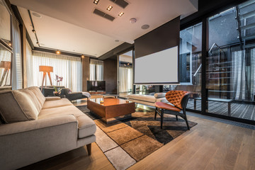 Interior of a living room in a luxury penthouse apartment - obrazy, fototapety, plakaty
